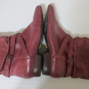 Studded strappy leather boots